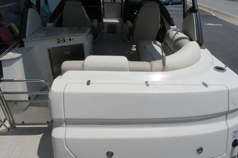 Slide: The Image of Simrad display showing "The Art of the Pontoon" on Avalon Excalibur LTD Elite Windshield 2026. - 58
