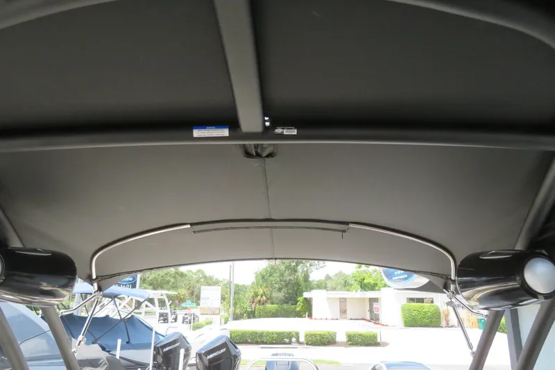 Slide: The Image of Battery compartment of 2026 Avalon Excalibur LTD Elite Windshield with NOCO Genius charger. - 65