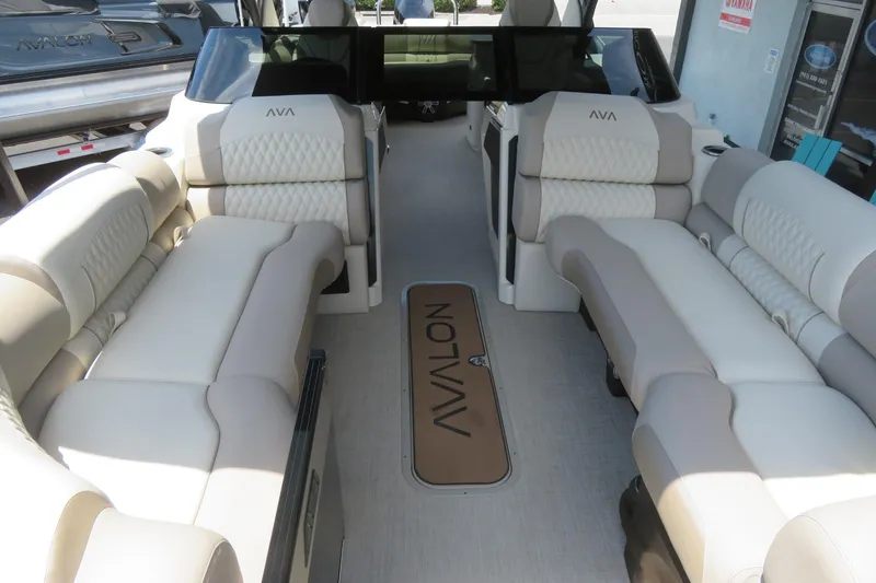 Slide: The Image of 2026 Avalon 2585 Excalibur LTD Elite Windshield luxury tri-toon on trailer in Sarasota, FL. - 13