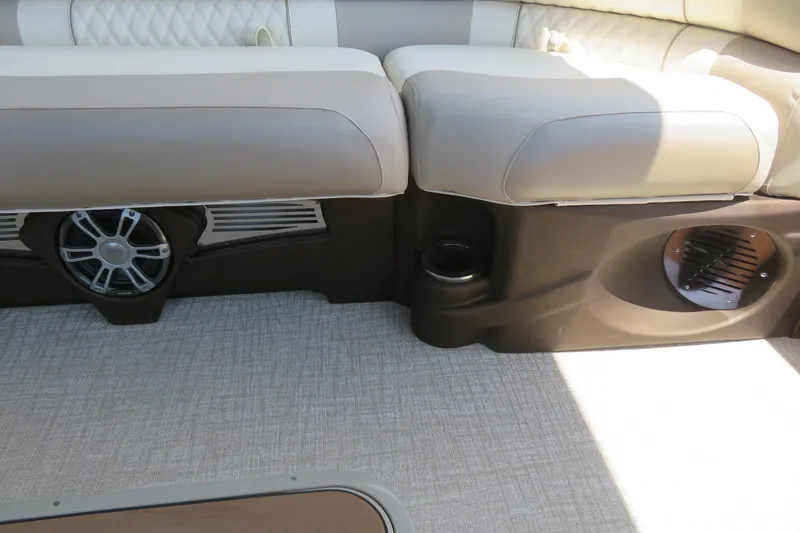 Slide: The Image of 2026 Avalon Excalibur LTD Elite Windshield pontoon boat on trailer, featuring sleek design and canopy. - 22