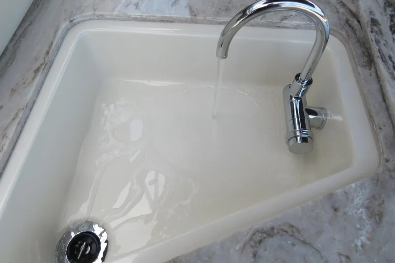 Slide: The Image of Storage compartment in 2026 Avalon Excalibur LTD Elite Windshield, featuring bubble-wrapped items. - 40