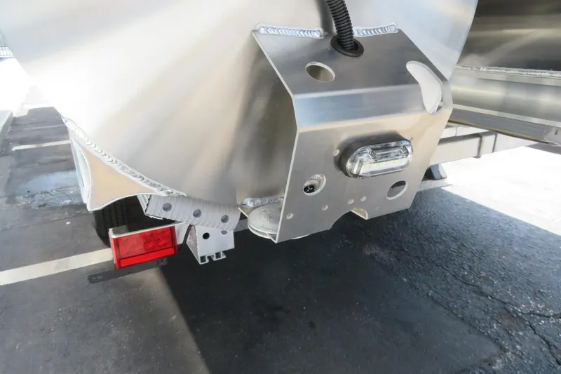 Slide: The Image of 2026 Avalon Excalibur LTD Elite Windshield storage compartment with equipment and battery setup. - 70