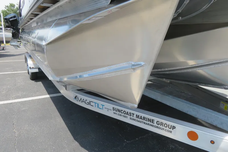 Slide: The Image of Speaker mounted on Avalon Excalibur LTD Elite Windshield, 2026 model, in a parking lot setting. - 74