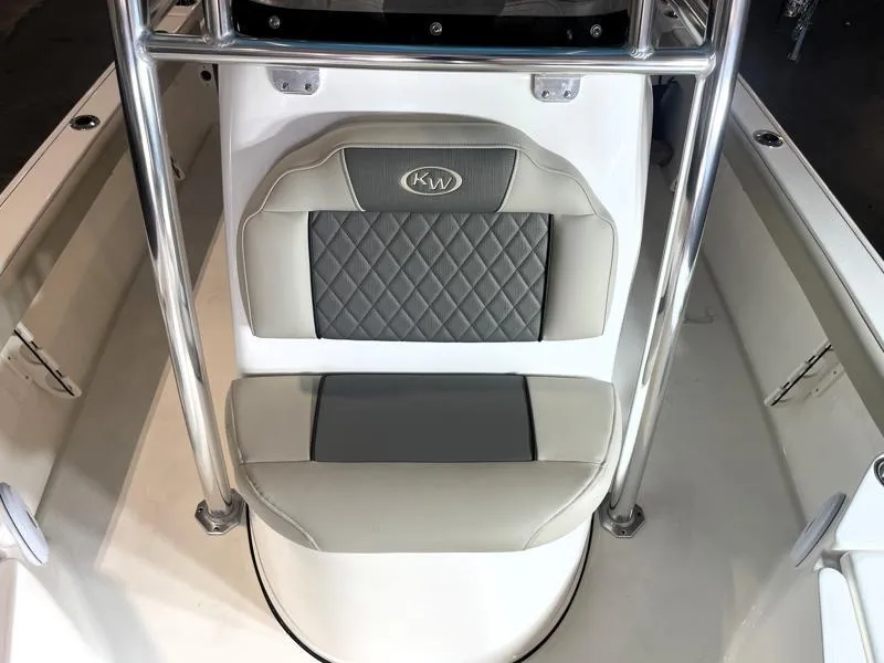 Slide: The Image of 2025 Key West 210 Bay Reef boat seat with gray and white upholstery. - 14