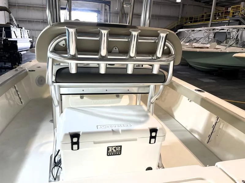 Slide: The Image of 2025 Key West 210 Bay Reef boat interior with K2 cooler and rod holders. - 18