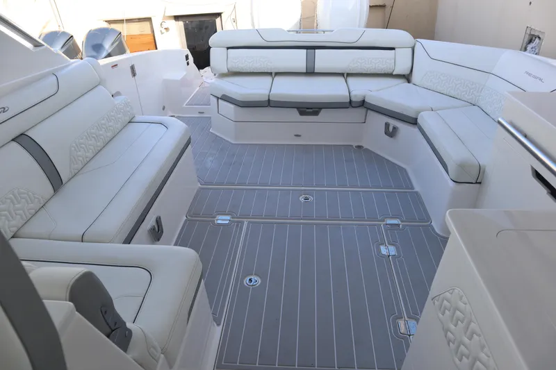 Slide: The Image of Luxurious 2022 Regal LX36 boat interior with spacious seating and elegant design. - 25