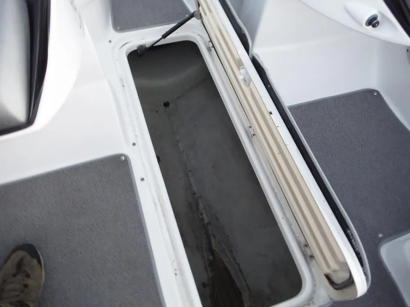 Slide: The Image of 2012 Sea-Doo Sport Boats 200 Speedster storage compartment, open and empty. - 15
