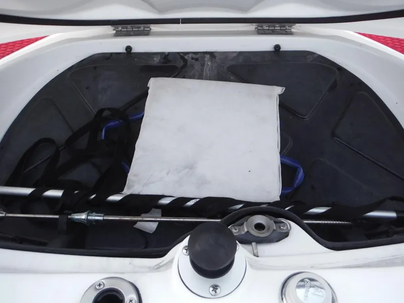 Slide: The Image of 2012 Sea-Doo Sport Boats 200 Speedster storage compartment with equipment and accessories. - 16