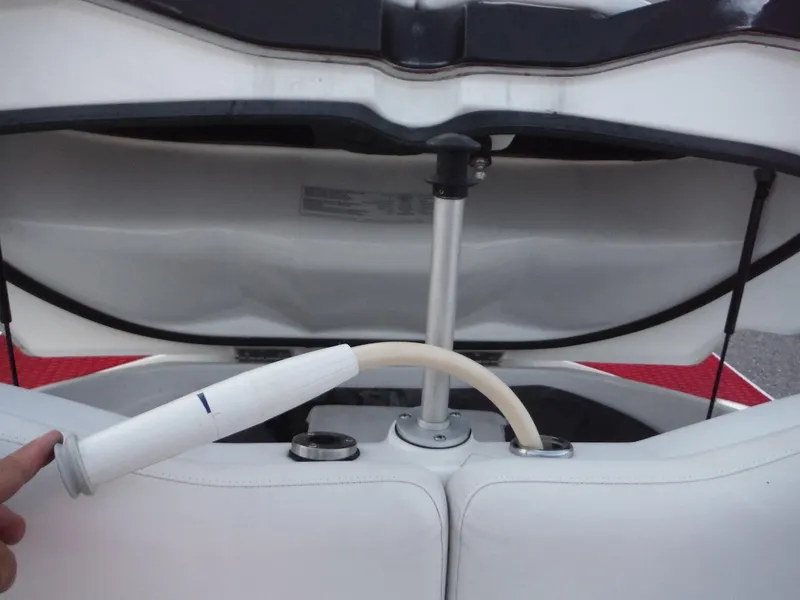 Slide: The Image of 2012 Sea-Doo Sport Boats 200 Speedster interior detail with open engine compartment. - 19