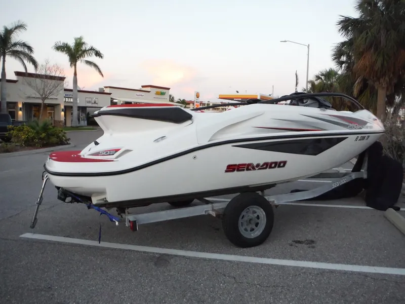 Slide: The Image of 2012 Sea-Doo Sport Boats 200 Speedster on trailer in parking lot. - 5