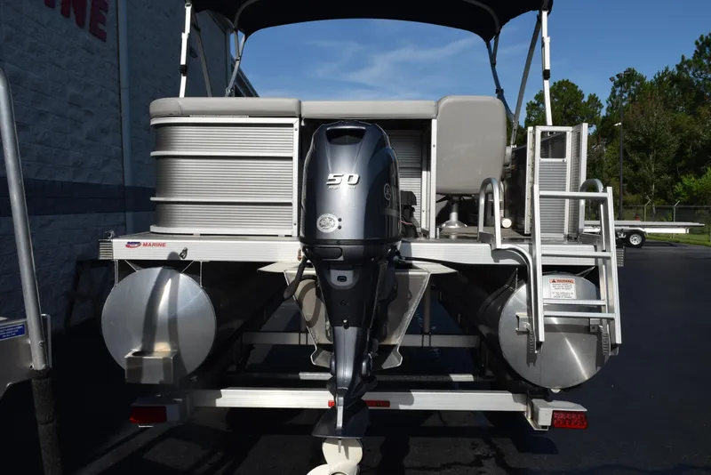 Slide: The Image of 2021 Bennington 18 SLX pontoon boat with Yamaha 50 HP outboard motor, rear view. - 5