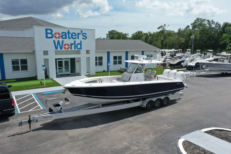 The Image of 2026 Jupiter 340LS boat on trailer at Boater's World dealership. - 0
