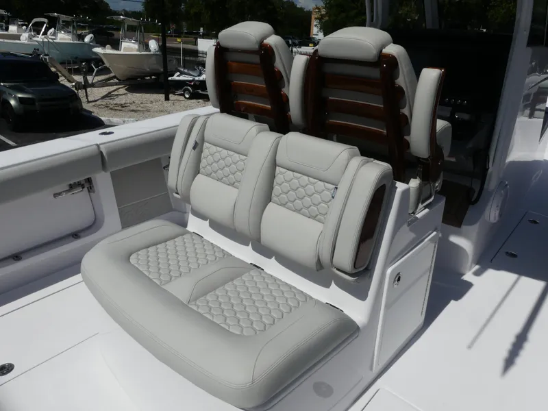 Slide: The Image of Luxury seating on 2026 Jupiter 340LS boat, featuring elegant design and premium materials. - 12