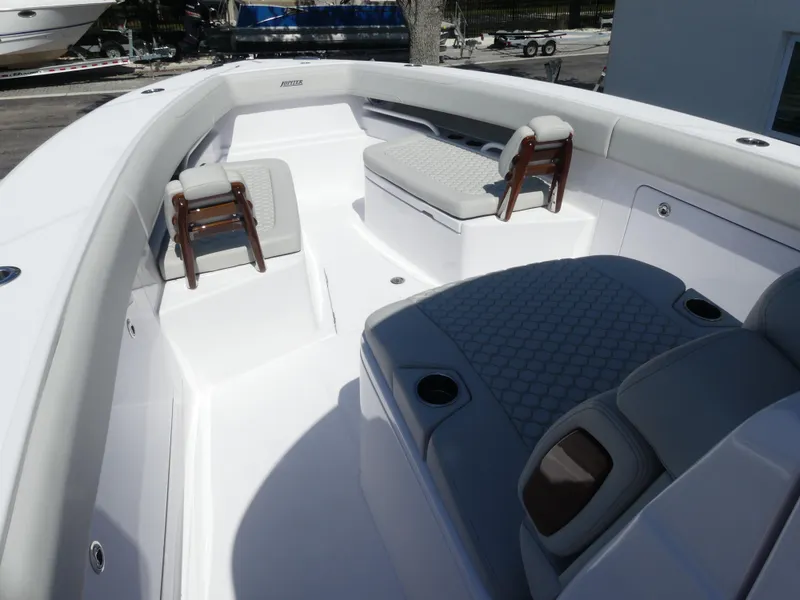 Slide: The Image of Luxurious seating on 2026 Jupiter 340LS boat, featuring modern design and comfortable cushions. - 24