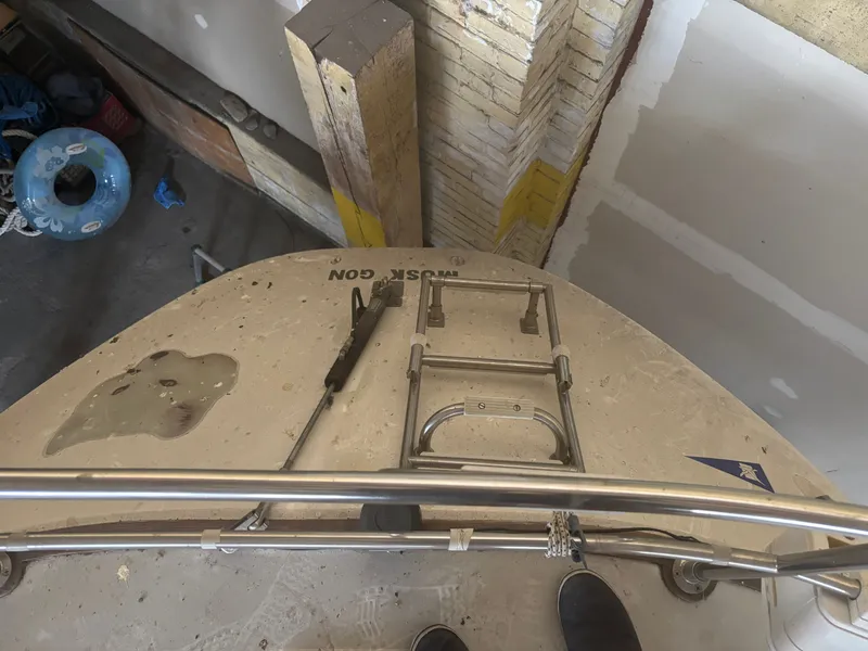 Slide: The Image of Top view of a 1987 Holby Tripp boat deck with ladder and railing. - 16