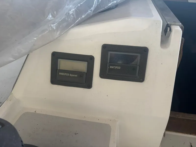 Slide: The Image of 1987 Holby Tripp boat dashboard with windspeed and boatspeed gauges. - 29