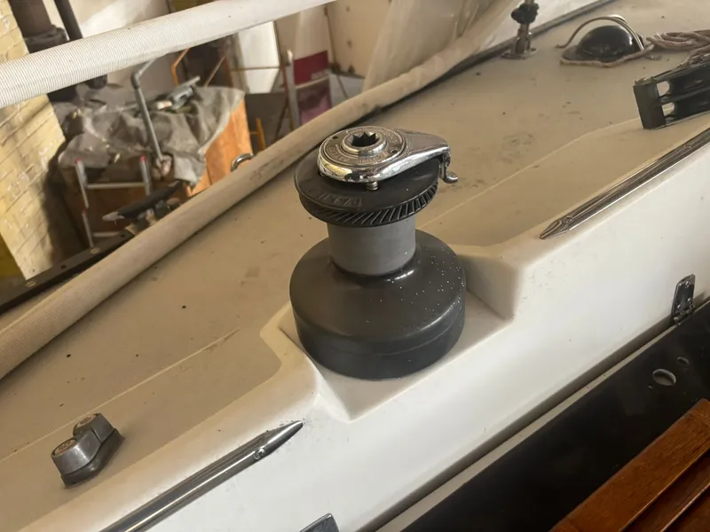 Slide: The Image of Sailboat deck with winch, Holby Tripp 1987 model, featuring nautical equipment. - 31