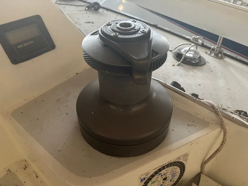 Slide: The Image of Sailboat winch on 1987 Holby Tripp, with wind direction gauge visible. - 34