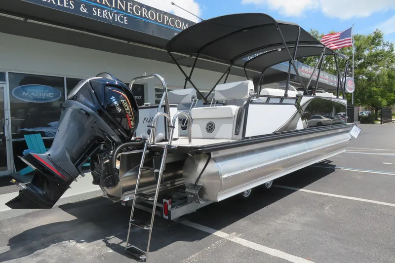 Slide: The Image of 2026 Avalon 2385 LSZ Quad Lounger Tri-toon boat in Sarasota, FL dealership. - 2