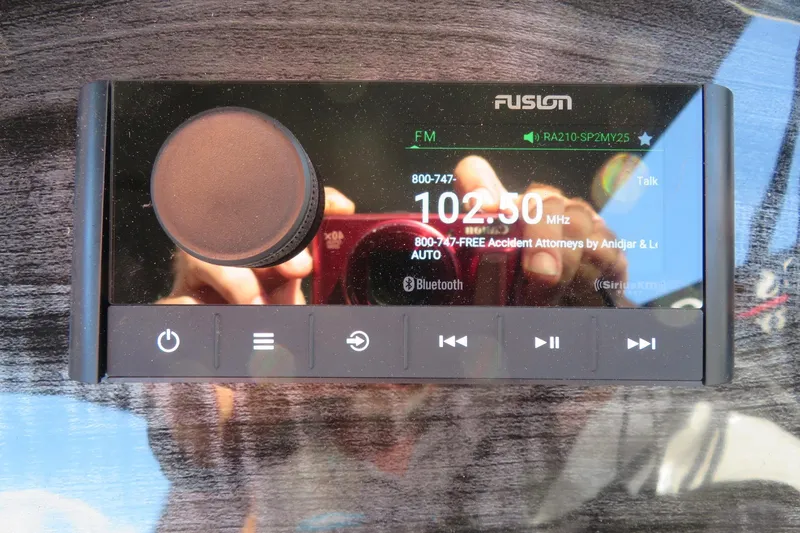 Slide: The Image of Fusion marine stereo display on Avalon 2385 LSZ Quad Lounger, 2026 model, Sarasota, FL. - 26
