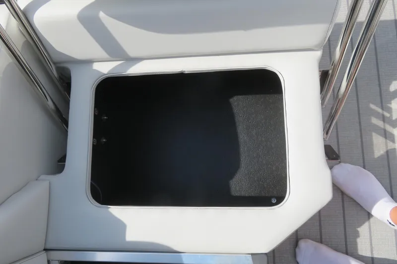 Slide: The Image of Storage compartment on Avalon 2385 LSZ Quad Lounger Shift luxury tri-toon boat, 2026 model. - 36