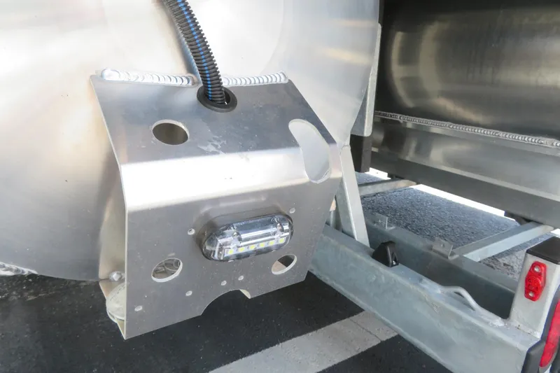 Slide: The Image of Close-up of Avalon 2385 LSZ Quad Lounger Shift pontoon detail, showcasing metal structure and light. - 64