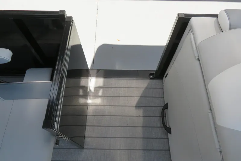 Slide: The Image of Interior view of 2026 Avalon 2385 LSZ Quad Lounger, featuring luxury seating and flooring. - 49