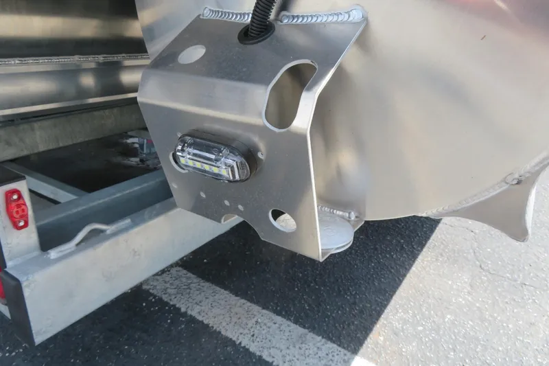 Slide: The Image of Close-up of 2026 Avalon 2385 LSZ Quad Lounger pontoon detail, featuring metal structure and light. - 63