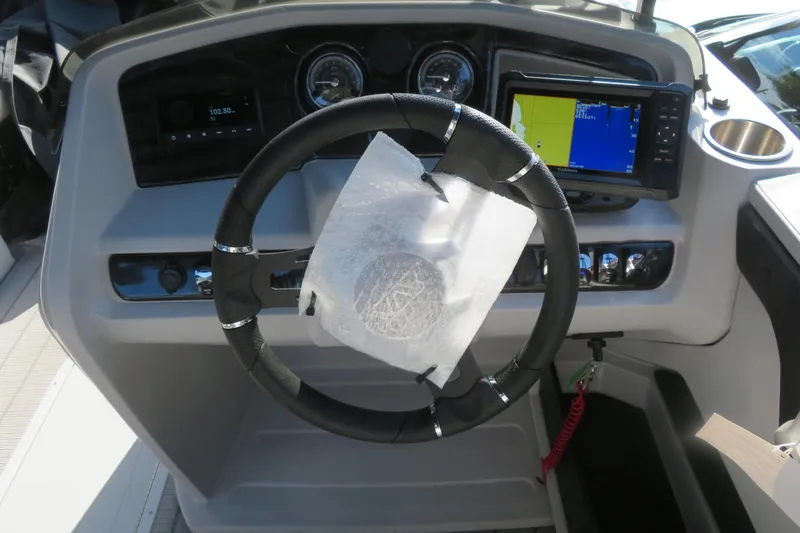 Slide: The Image of Steering console of 2026 Avalon 2385 LSZ Quad Lounger Shift, featuring modern controls and display. - 22