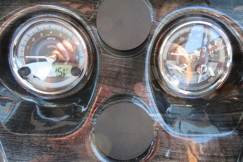 Slide: The Image of Dashboard of 2026 Avalon 2385 LSZ Quad Lounger with RPM and speed gauges. - 24