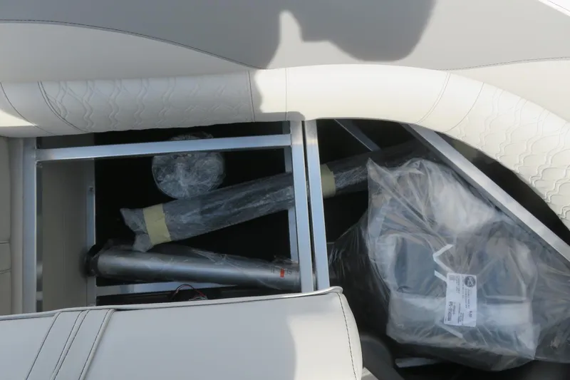Slide: The Image of Storage compartment of 2026 Avalon 2385 LSZ Quad Lounger, showcasing interior components. - 30