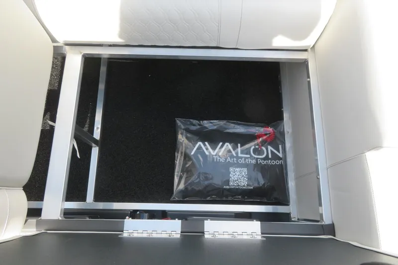 Slide: The Image of Avalon 2385 LSZ Quad Lounger storage compartment with branded bag, 2026 model, Sarasota, FL. - 37