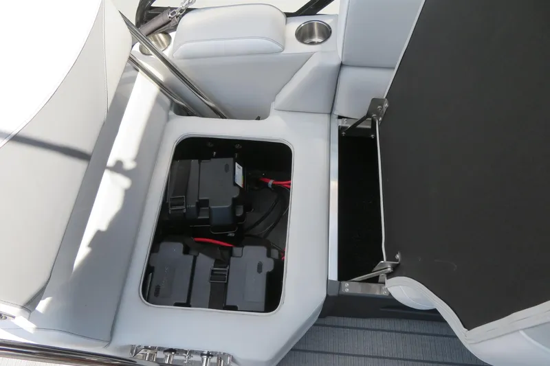 Slide: The Image of Battery compartment of 2026 Avalon 2385 LSZ Quad Lounger Shift luxury tri-toon boat. - 58
