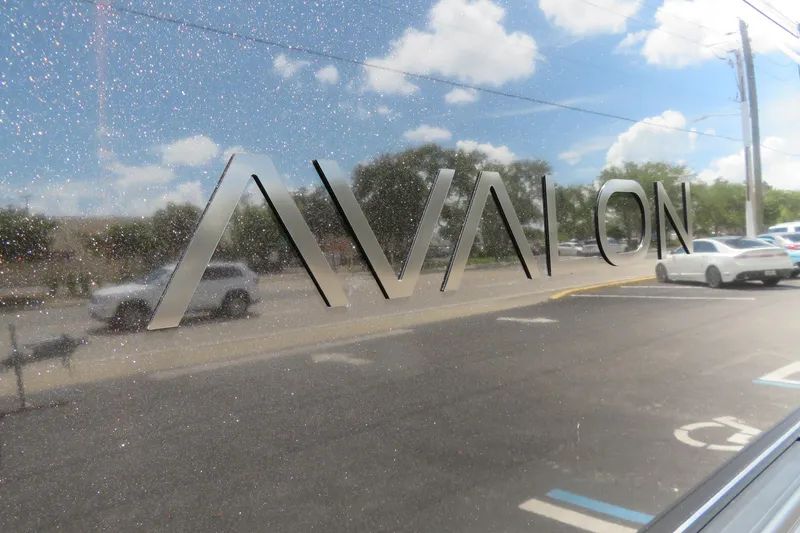Slide: The Image of Reflective Avalon logo on 2026 2385 LSZ Quad Lounger, Sarasota, FL, with street view. - 8