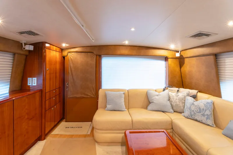 Slide: The Image of Luxurious interior of 2008 Ocean Yachts 54 Super Sport with plush seating and elegant wood finishes. - 25