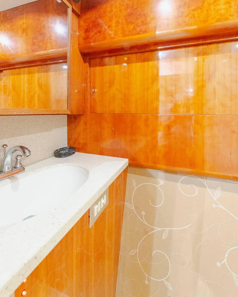 Slide: The Image of Luxurious wooden bathroom interior on a 2008 Ocean Yachts 54 Super Sport. - 30