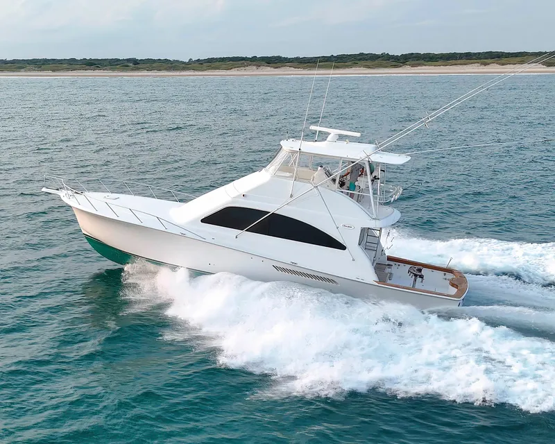 Slide: The Image of 2008 Ocean Yachts 54 Super Sport cruising on open water. - 4