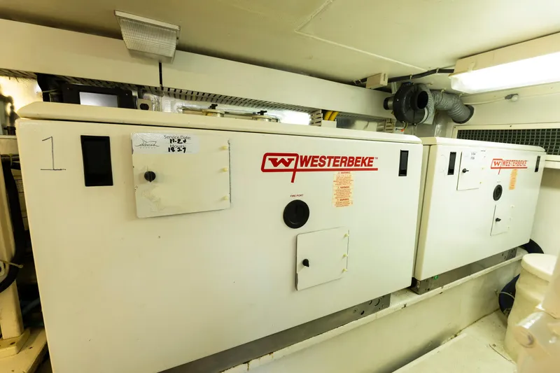 Slide: The Image of Engine room of 2008 Ocean Yachts 54 Super Sport with Westerbeke generators. - 40
