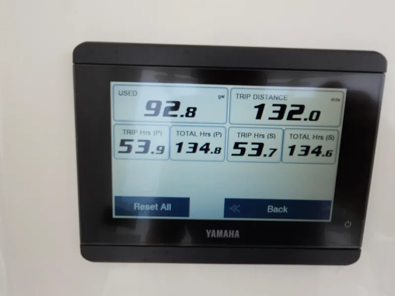 Slide: The Image of Yamaha display showing fuel usage and trip data on a 2021 Regulator 25 boat. - 21