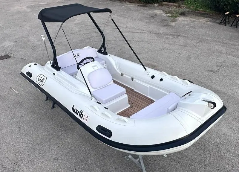 Slide: The Image of 2024 Aqvaboats LUXRIB 14 inflatable boat with canopy and seating. - 3