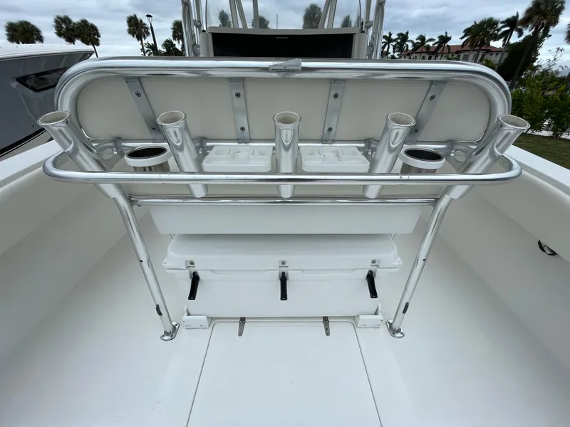 Slide: The Image of Venture 34 Tournament 2000 boat with rod holders and storage, sleek design. - 15