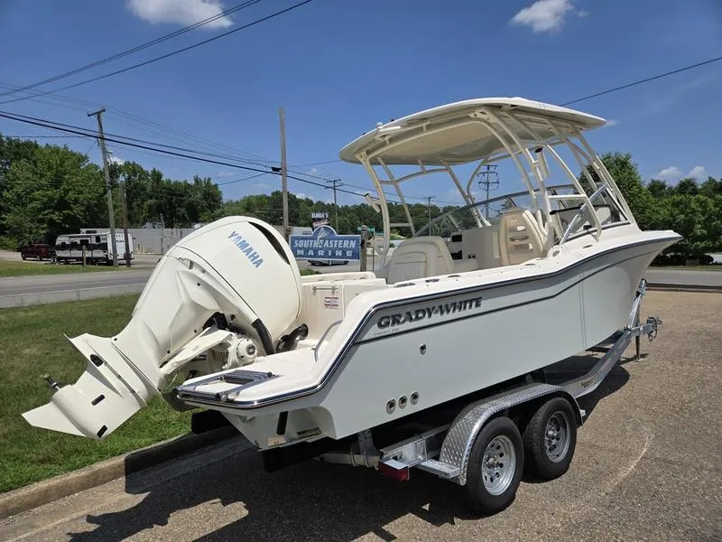 The Image of 2026 Grady-White Freedom 235 boat on trailer at Southeastern Marine dealership. - 2