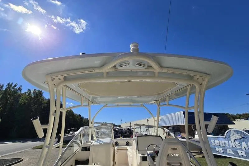 Slide: The Image of 2026 Grady-White Freedom 235 boat interior with seating and helm station. - 29