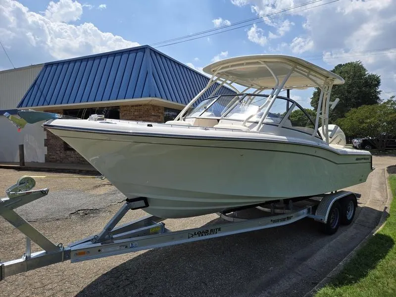 Slide: The Image of 2026 Grady-White Freedom 235 boat interior, featuring seating and storage compartments. - 9