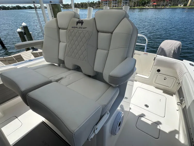 Slide: The Image of 2024 World Cat 280ccx boat seating with luxurious upholstery by the water. - 36