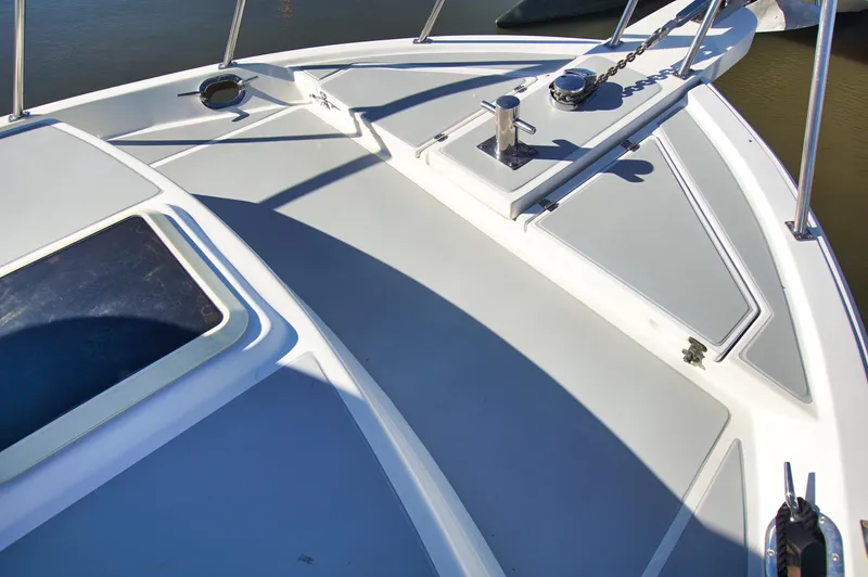 Slide: The Image of Deck of 2001 Monk 36 (Hull #215) boat with hatches and anchor chain. - 10