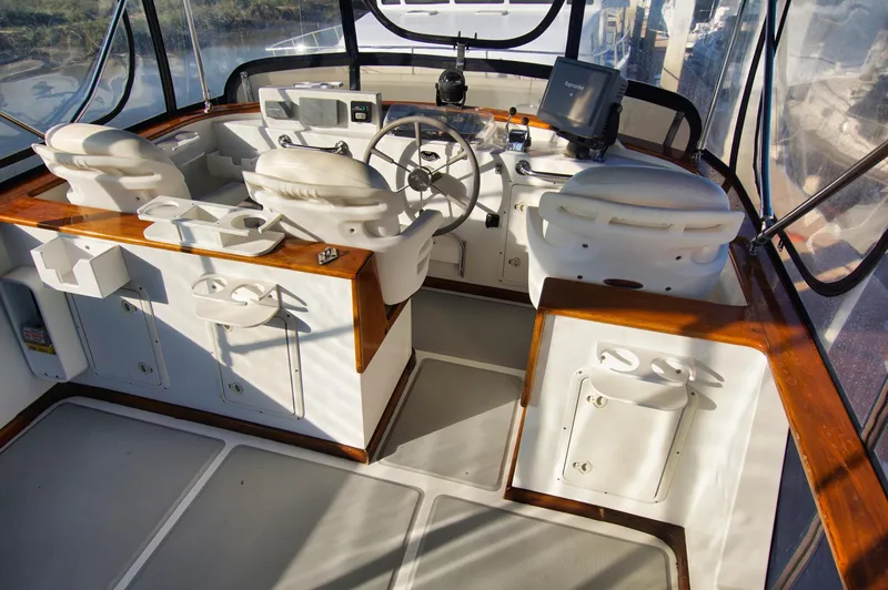 Slide: The Image of Helm of 2001 Monk 36 (Hull #215) with dual seats and navigation equipment. - 11
