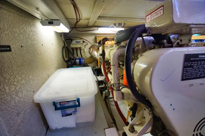 Slide: The Image of Engine room of 2001 Monk 36 (Hull #215) with storage container and equipment. - 40