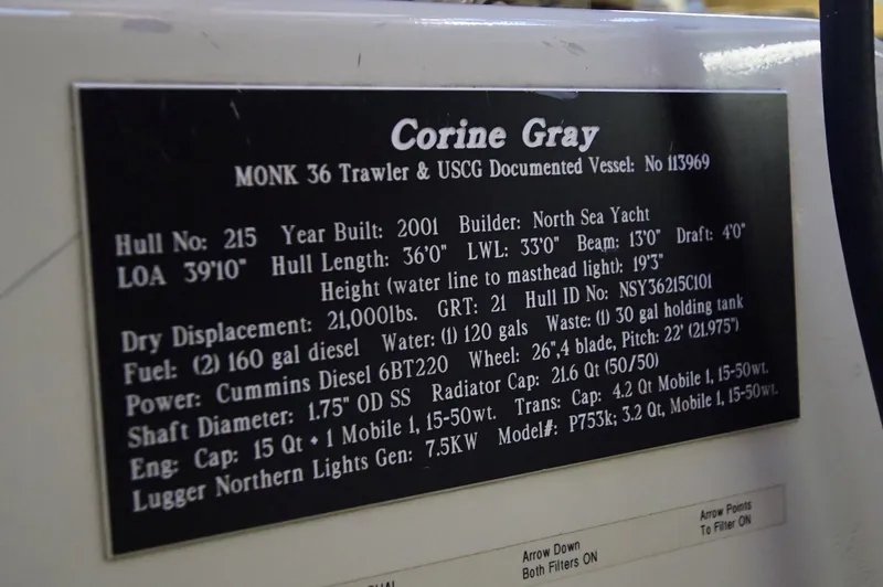 Slide: The Image of Plaque detailing specifications of the 2001 Monk 36 Trawler, Hull #215. - 42