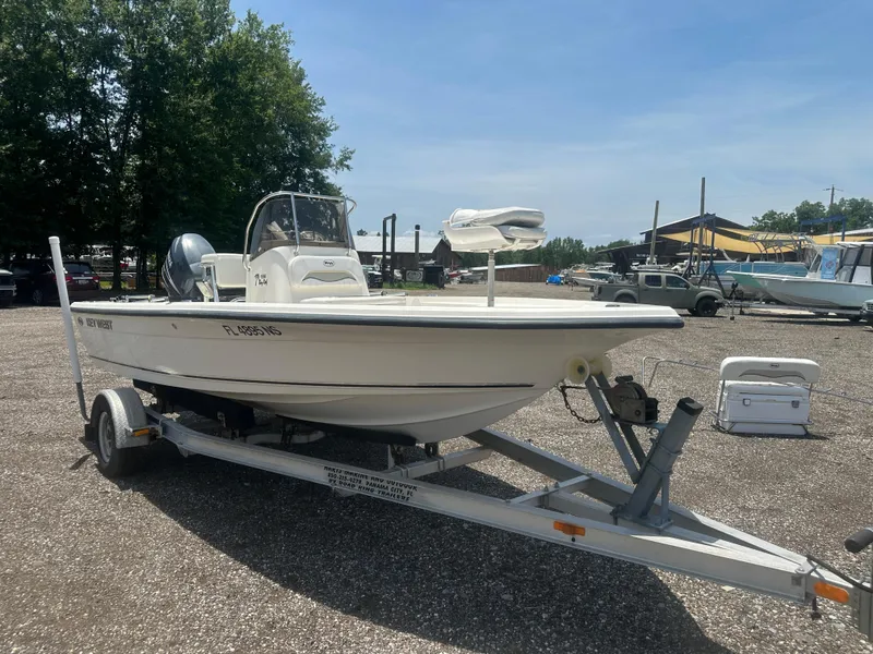 Slide: The Image of 2008 Key West 186 Bay Reef boat on trailer in outdoor setting. - 10